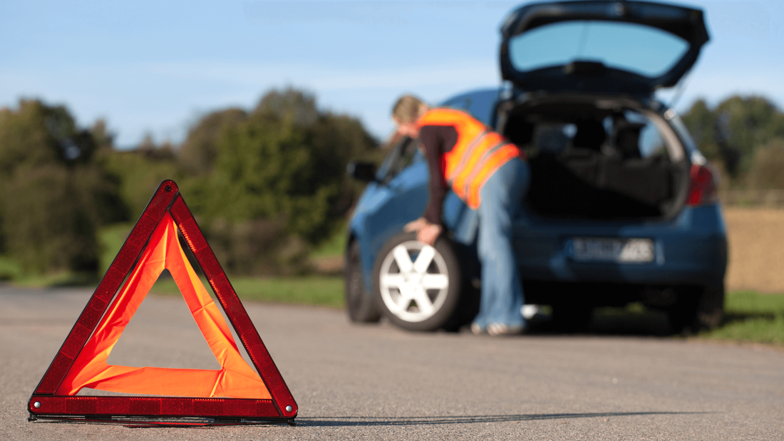 Tow truck helping flat tire st clair shores