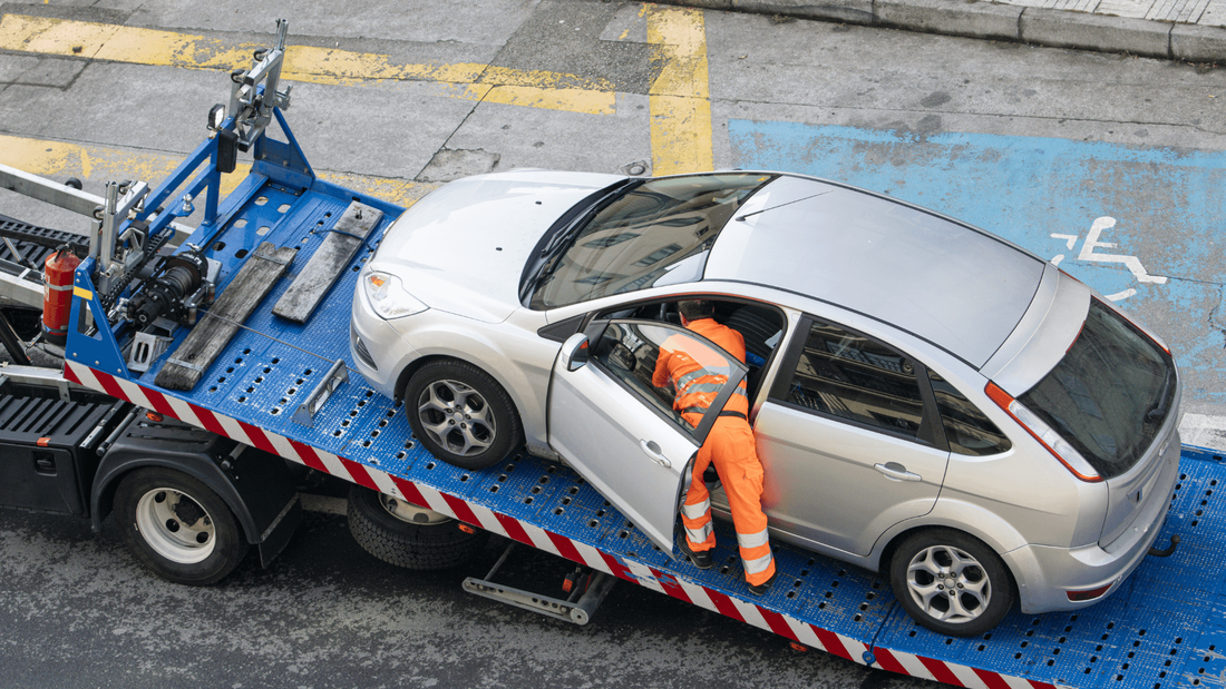 Towing a car away roadside assistance