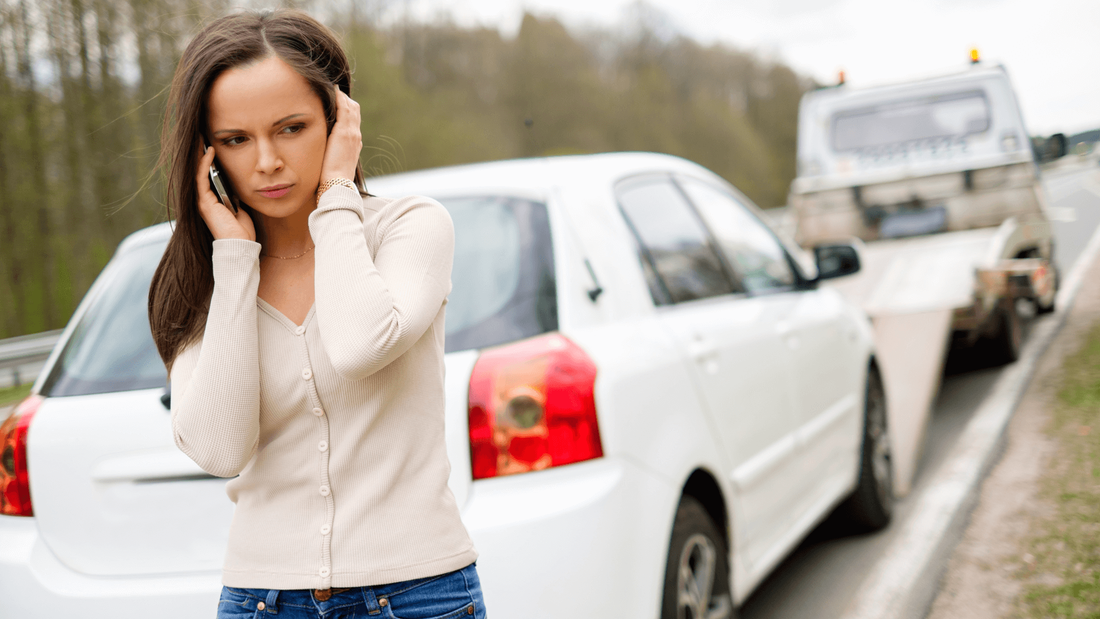 Woman needing towing assistance in st clair shores MI